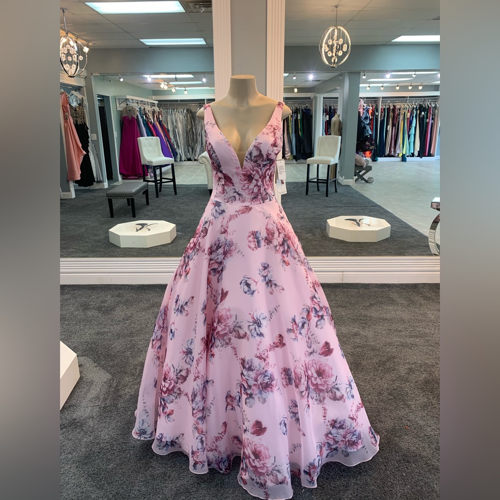 This Is A Size 6 Floral Ballgown. Deep V Neck With Low Cut Back.